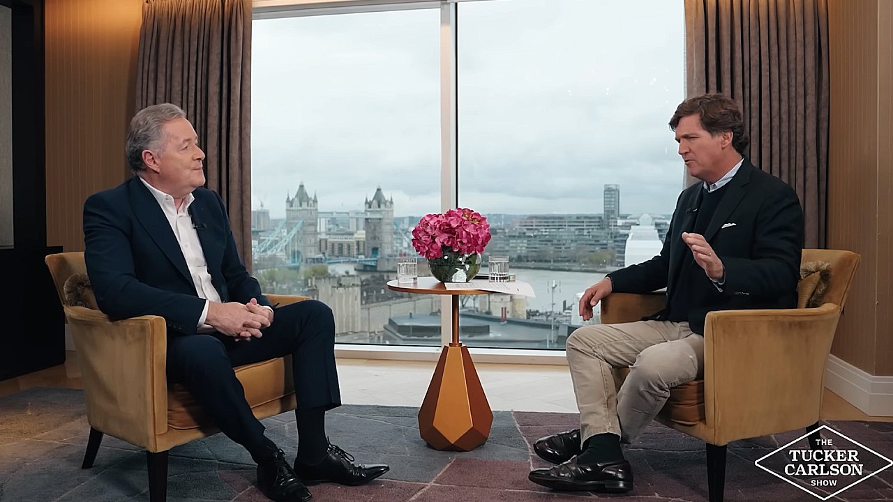 Watch: Tucker Carlson Dares Piers Morgan To Say ‘Banned’ Word
